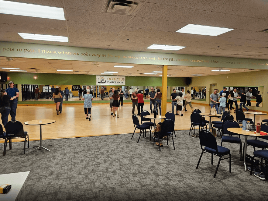 A picture of students taking a group lesson at Invictus Dancesport